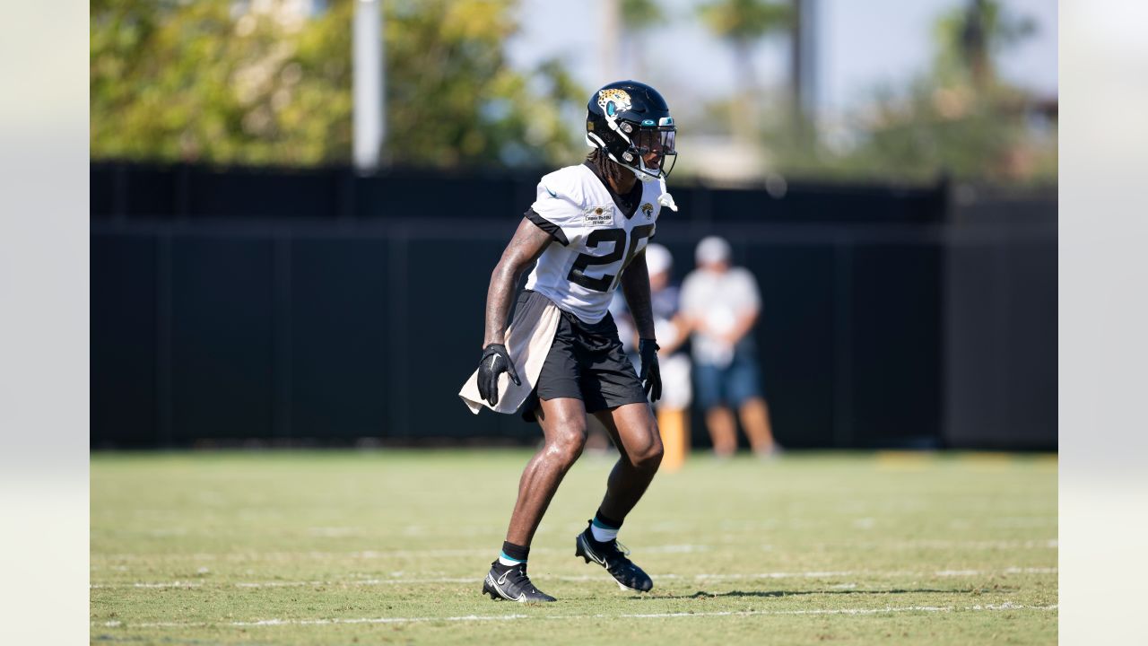 Jacksonville Jaguars offensive tackle Anton Harrison (76) puts on his helmet  before a drill during an NFL football practice, Monday, June 12, 2023, in  Jacksonville, Fla. (AP Photo/John Raoux Stock Photo - Alamy