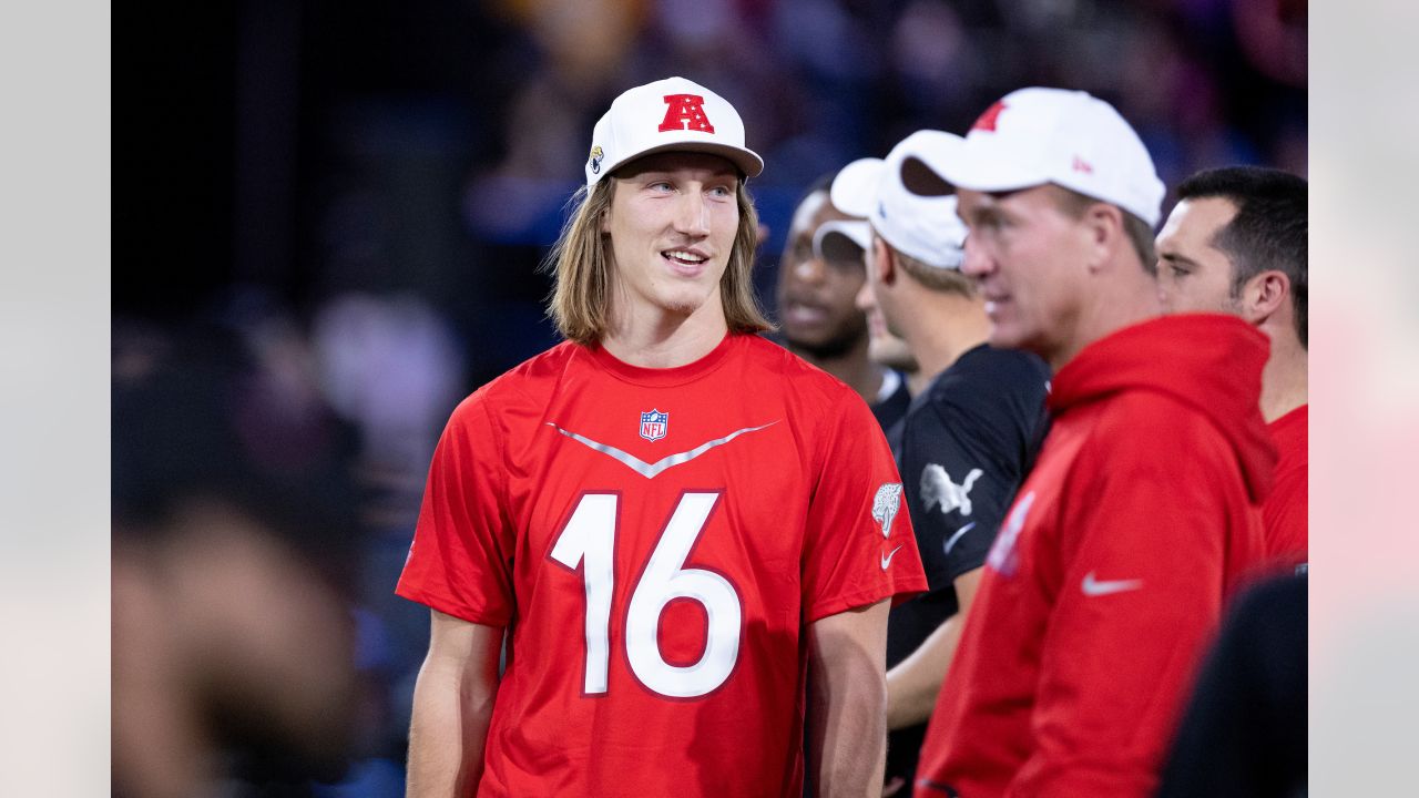 AFC quarterback Trevor Lawrence (16) of the Jacksonville Jaguars stands  alongside coach Peyton Manning during the flag football event at the NFL  Pro Bowl, Sunday, Feb. 5, 2023, in Las Vegas. (AP