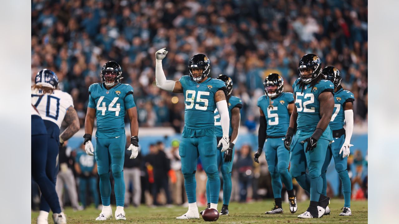 The Sword of Honor is moved to the field before the first half of an NFL  football game between the Tennessee Titans and the Jacksonville Jaguars,  Thursday, Dec. 6, 2018, in Nashville