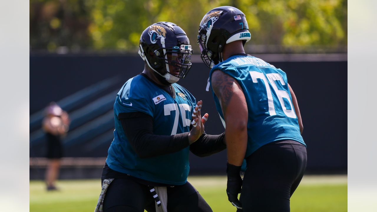 Jacksonville Jaguars tight end Chris Manhertz (84) walks off the field  after an NFL football game against the Denver Broncos at Wembley Stadium in  London, Sunday, Oct. 30, 2022. The Denver Broncos