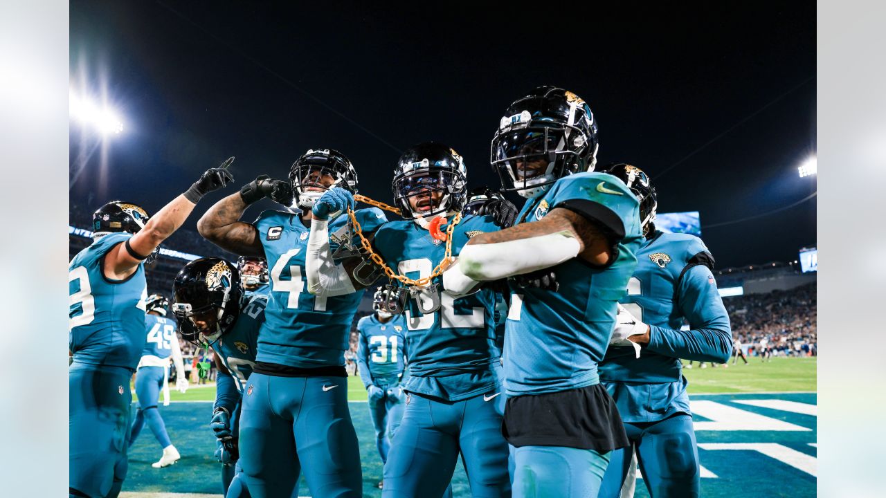 The Sword of Honor is moved to the field before the first half of an NFL  football game between the Tennessee Titans and the Jacksonville Jaguars,  Thursday, Dec. 6, 2018, in Nashville