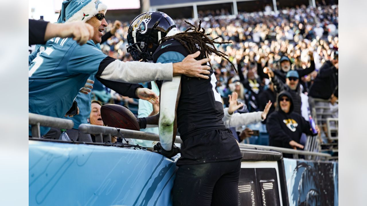 A Cowboys fan sports a pumpkin head for Halloween during an NFL game  between Dallas and the Jacksonville Jaguars at Cowboys Stadium in  Arlington, Texas, Sunday, October 31, 2010. The Jaguars defeated