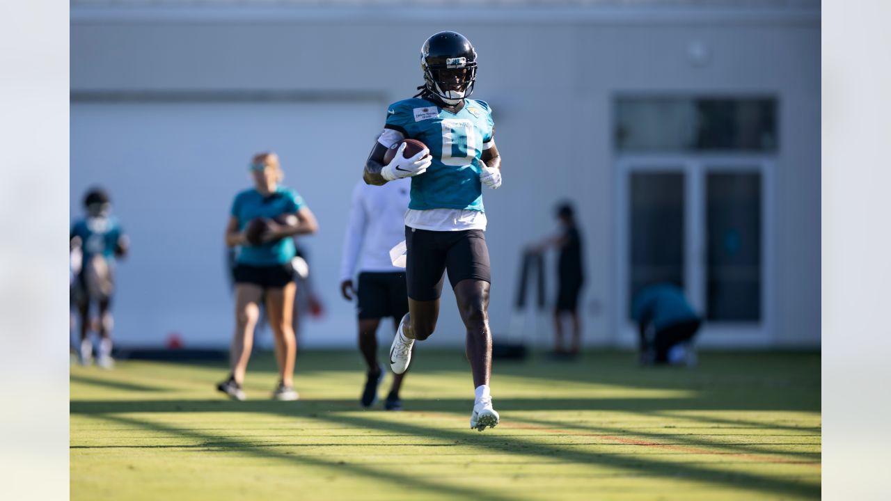 Jacksonville Jaguars offensive tackle Anton Harrison (76) puts on his helmet  before a drill during an NFL football practice, Monday, June 12, 2023, in  Jacksonville, Fla. (AP Photo/John Raoux Stock Photo - Alamy