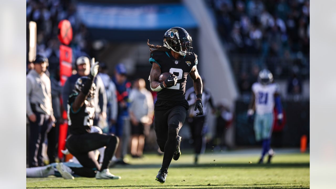 Jacksonville Jaguars offensive tackle Anton Harrison (76) defends against  Dallas Cowboys defensive tackle Osa Odighizuwa (97) during the first half  of an NFL preseason football game, Saturday, Aug. 12, 2023, in Arlington