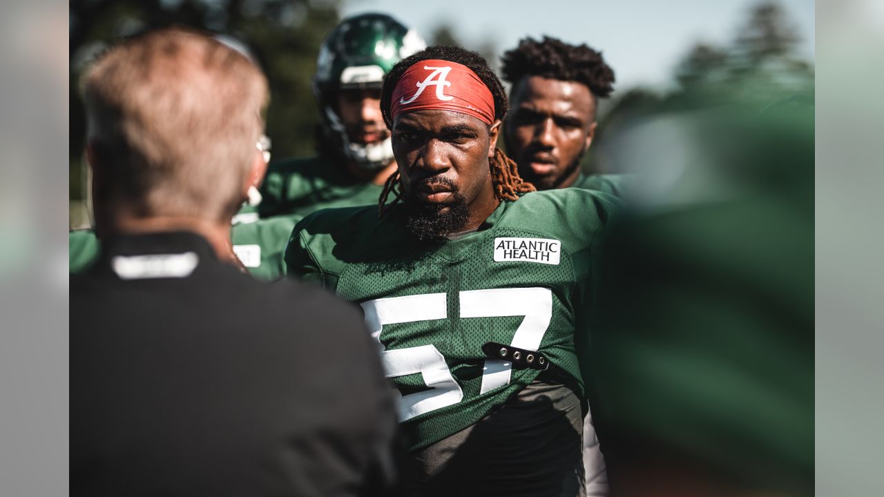 Wrestlers grapple with football at Jets camp