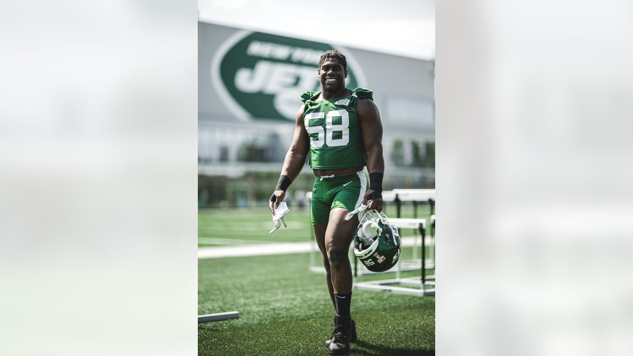 New York Jets linebacker Jermaine Johnson (52) warms up before playing  against the Buffalo Bills in