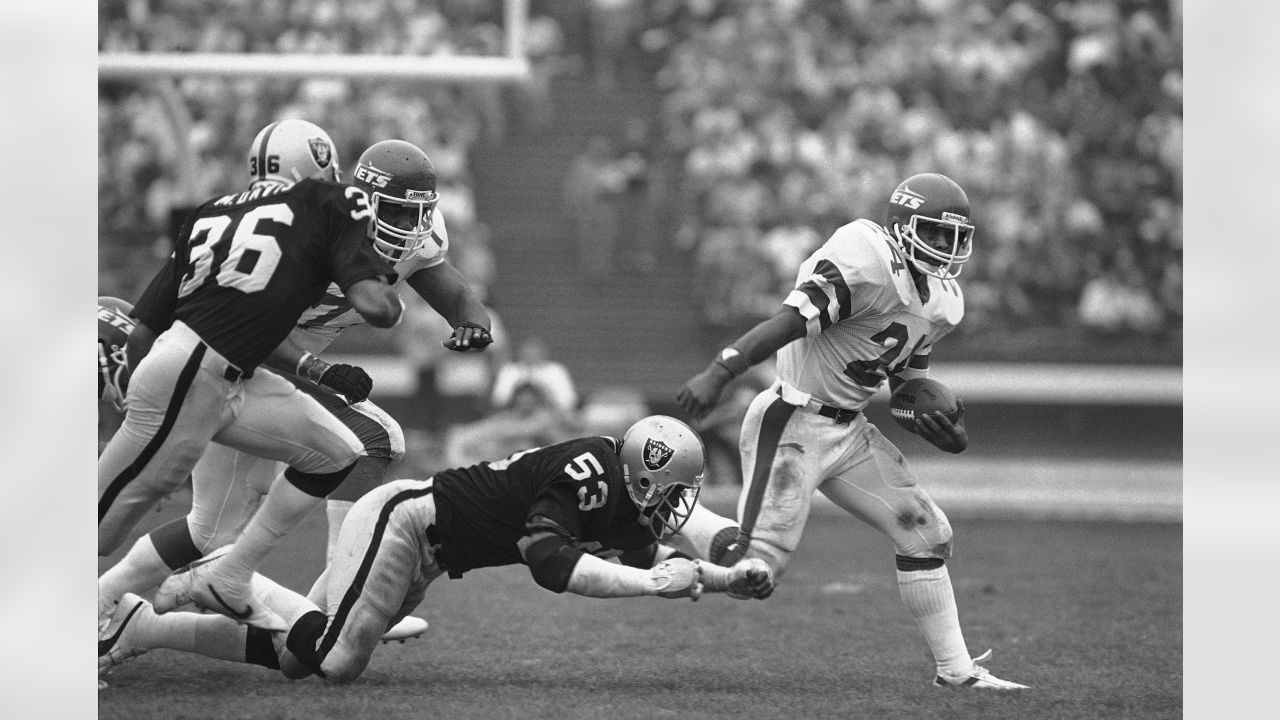 New England Patriots Ed Philpott makes a splash as he lands on rain soaked  synthetic surface and upsets New York Jets John Riggins, Sunday, Oct. 11,  1971, Foxboro, Mass. New England Patriots