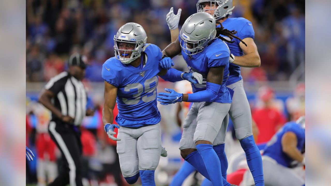 Detroit Lions defensive back Dee Virgin (30) steps on the line for