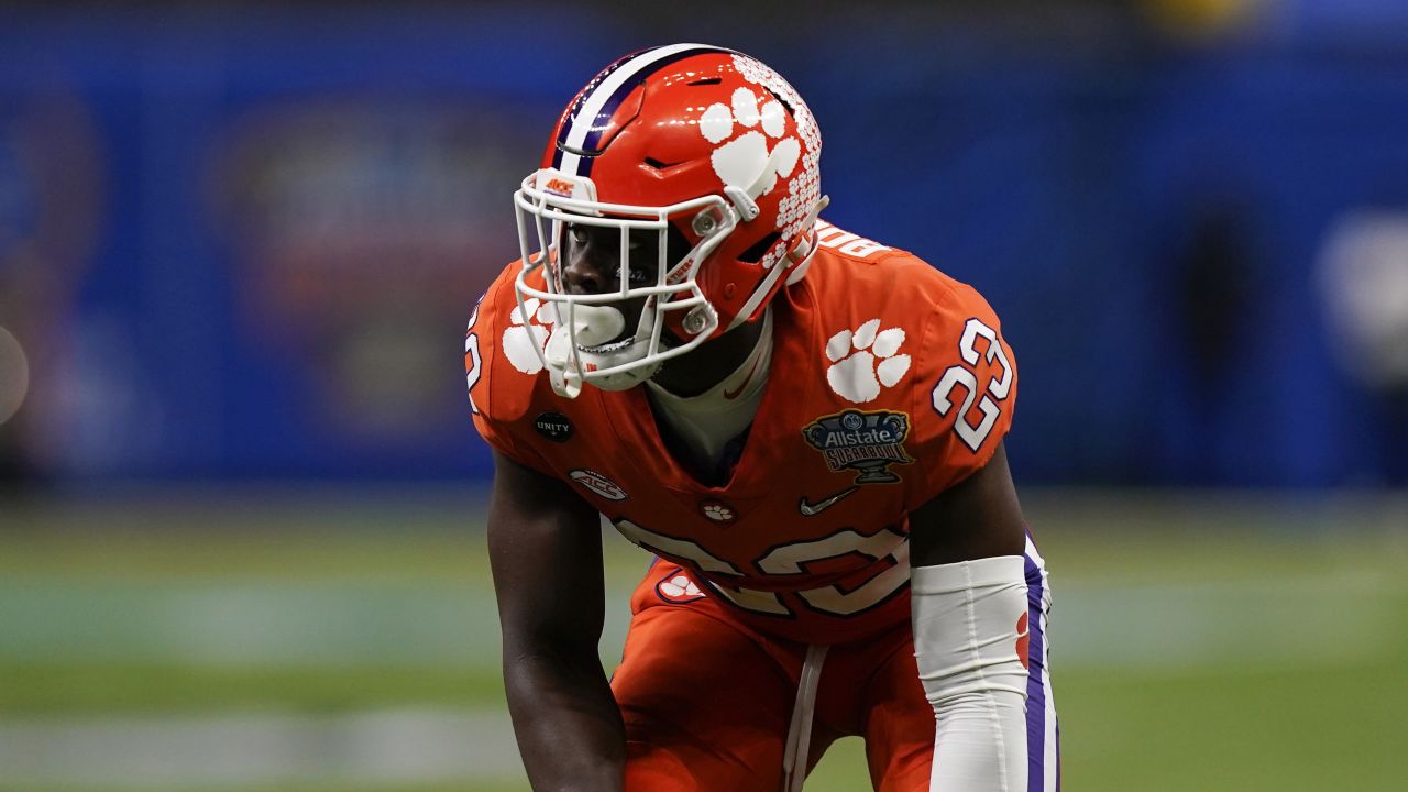 January 1, 2021: Clemson defensive back Andrew Booth Jr. (23) tries to  bring down Ohio State receiver Chris Olave (2)during the Allstate Sugar  Bowl Classic Playoff Semifinal game between the Clemson Tigers