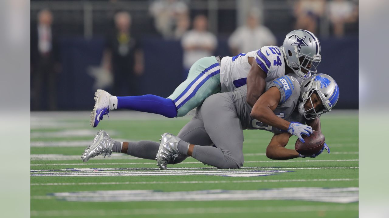 Detroit Lions wide receiver Golden Tate (15) is tackled by