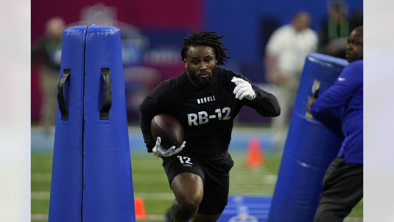 Detroit Lions running back Mohamed Ibrahim runs a drill during an