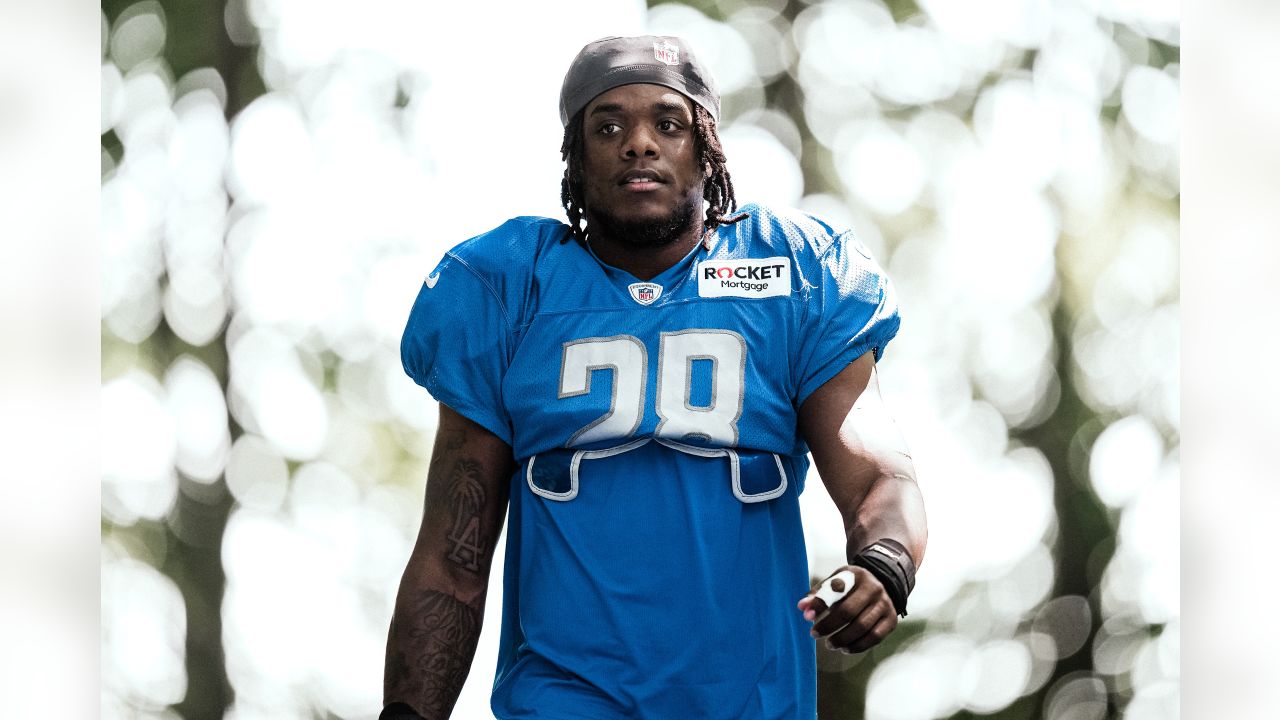 FOXBOROUGH, MA - OCTOBER 09: Detroit Lions running back Jamaal Williams  (30) interacts with fans prior to the NFL game between Detroit Lions and  New England Patriots on October 9, 2022, at