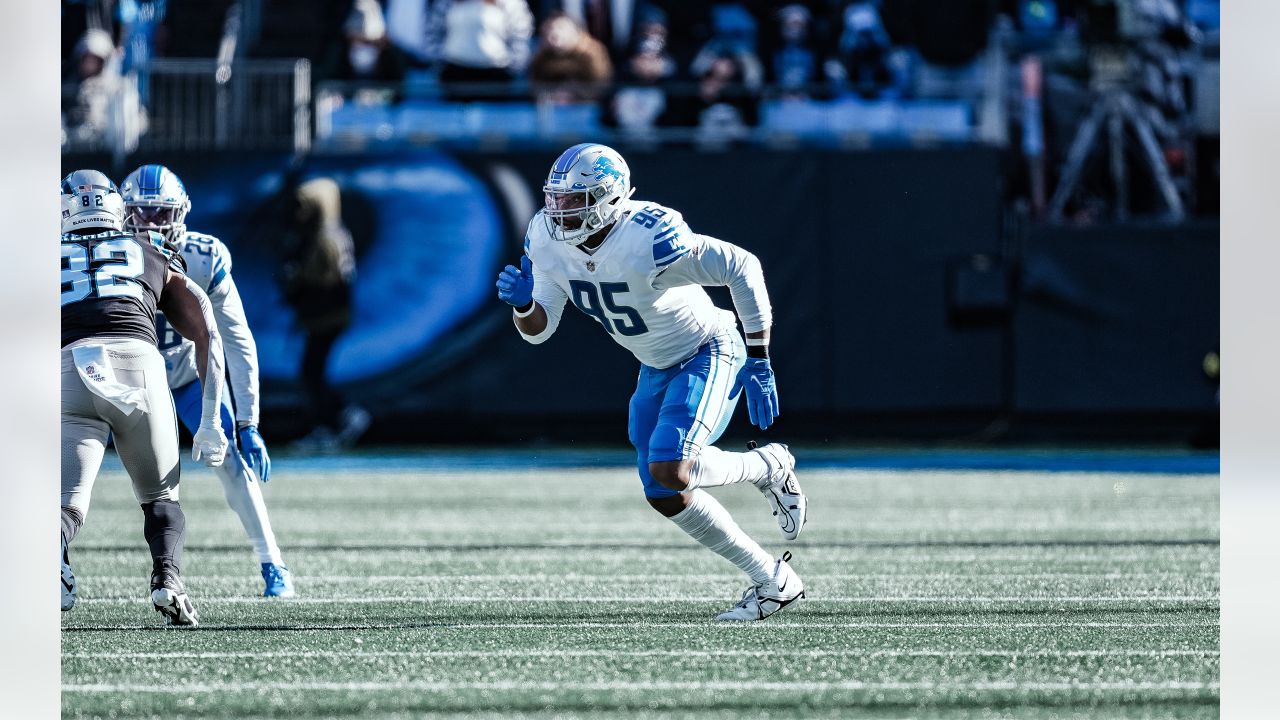 Detroit Lions running back Devine Ozigbo (30) watches from the sideline  during an NFL preseason football game against the Carolina Panthers,  Friday, Aug. 25, 2023, in Charlotte, N.C. (AP Photo/Brian Westerholt Stock