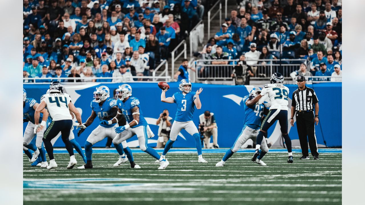 Detroit Lions punter Jack Fox (3) punts against the Seattle