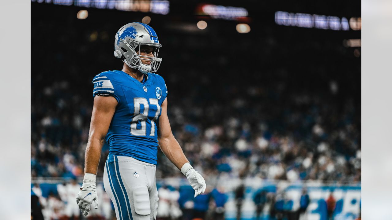 Detroit Lions tight end James Mitchell (82) carries the ball against the  New York Giants during the first half of an NFL preseason football game,  Friday, Aug. 11, 2023, in Detroit. (AP