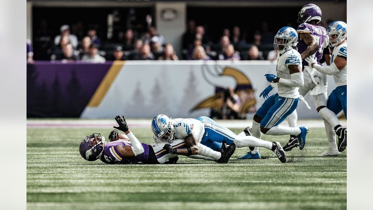 DETROIT, MI - DECEMBER 11: Detroit Lions Defensive End (97) Aidan  Hutchinson closes in for a sack on Minnesota Vikings QB Kirk Cousins (8)  during the game between Minnesota Vikings and Detroit