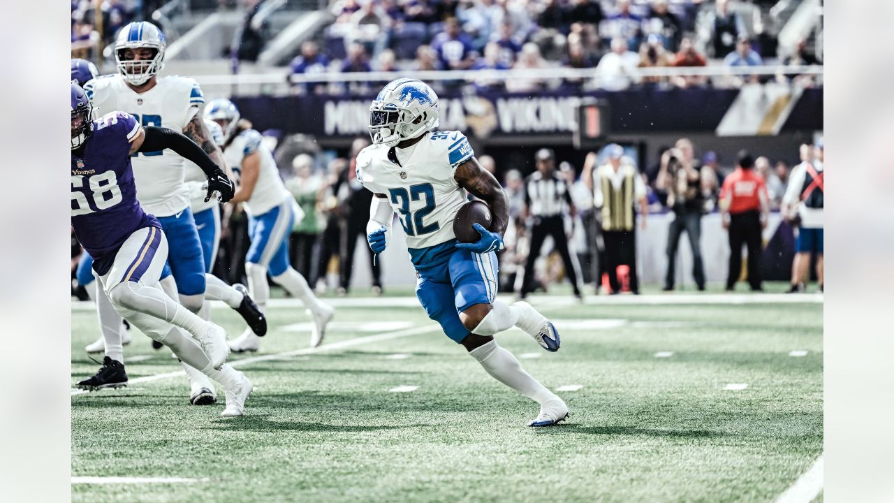 DETROIT, MI - OCTOBER 20: Detroit Lions RB Kerryon Johnson (33) readies  himself to stiff arm Minnesota Vikings S Anthony Harris (41) during NFL game  between Minnesota Vikings and Detroit Lions on