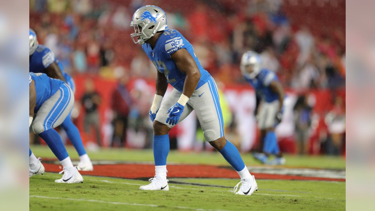 Tampa Bay Buccaneers running back Cadillac Williams (24) finds an opening  in the Detroit Lion defense during an NFL football game between the  Buccaneers and the Lions Sunday in Tampa, Fla, December