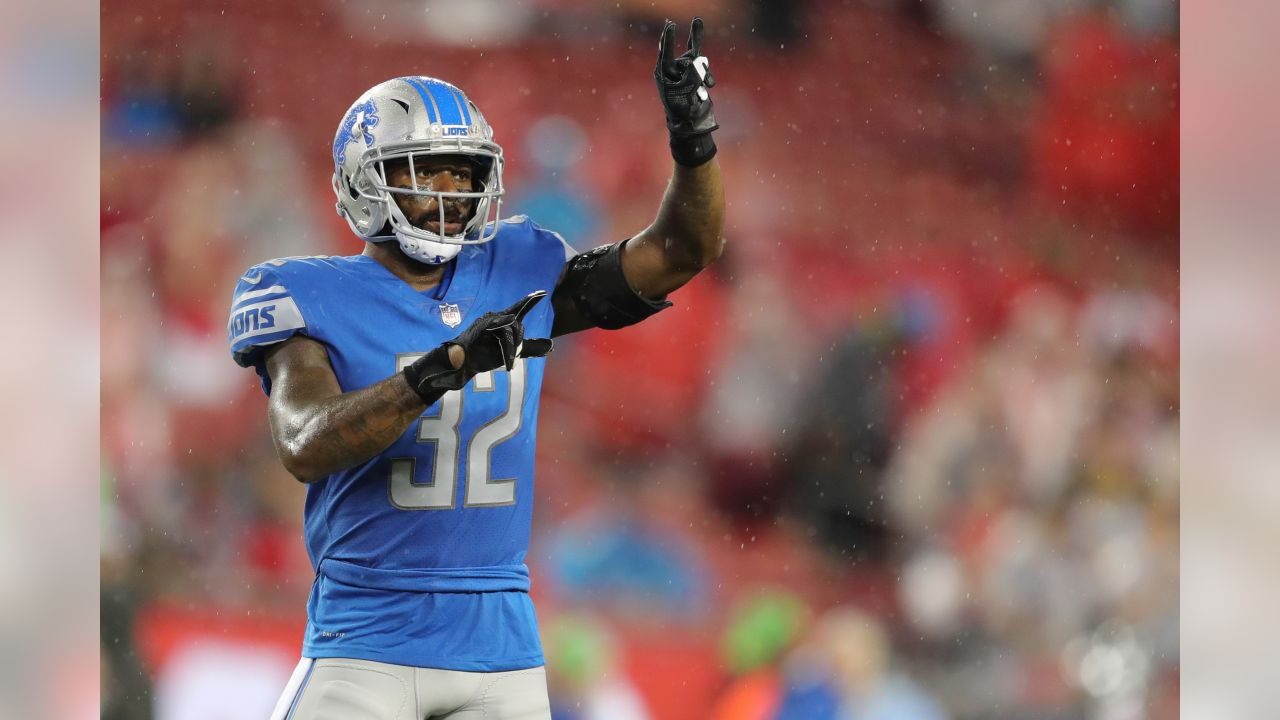 Tampa Bay Buccaneers running back Cadillac Williams (24) finds an opening  in the Detroit Lion defense during an NFL football game between the  Buccaneers and the Lions Sunday in Tampa, Fla, December