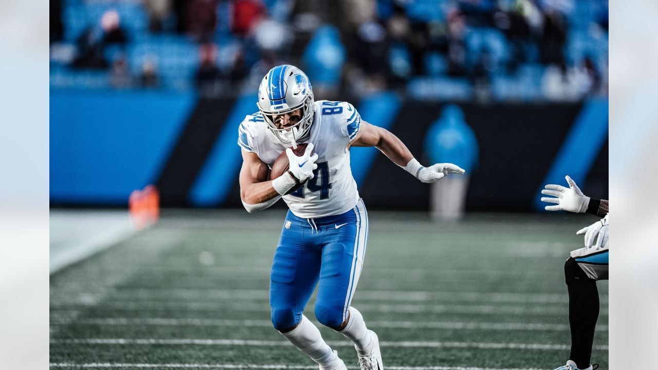 Charlotte, NC USA; Carolina Panthers quarterback Sam Darnold (14) runs in  for a touchdown during an NFL game against the Detroit Lions at Bank of  America Stadium, Saturday, December 24, 2022. The