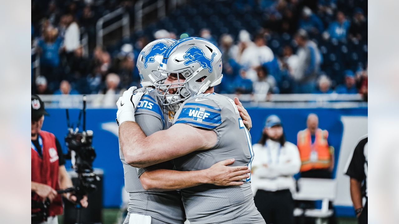 Detroit Lions players warmup before an NFL football game against