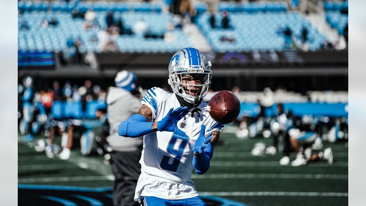 Detroit Lions running back Devine Ozigbo (30) watches from the sideline  during an NFL preseason football game against the Carolina Panthers,  Friday, Aug. 25, 2023, in Charlotte, N.C. (AP Photo/Brian Westerholt Stock