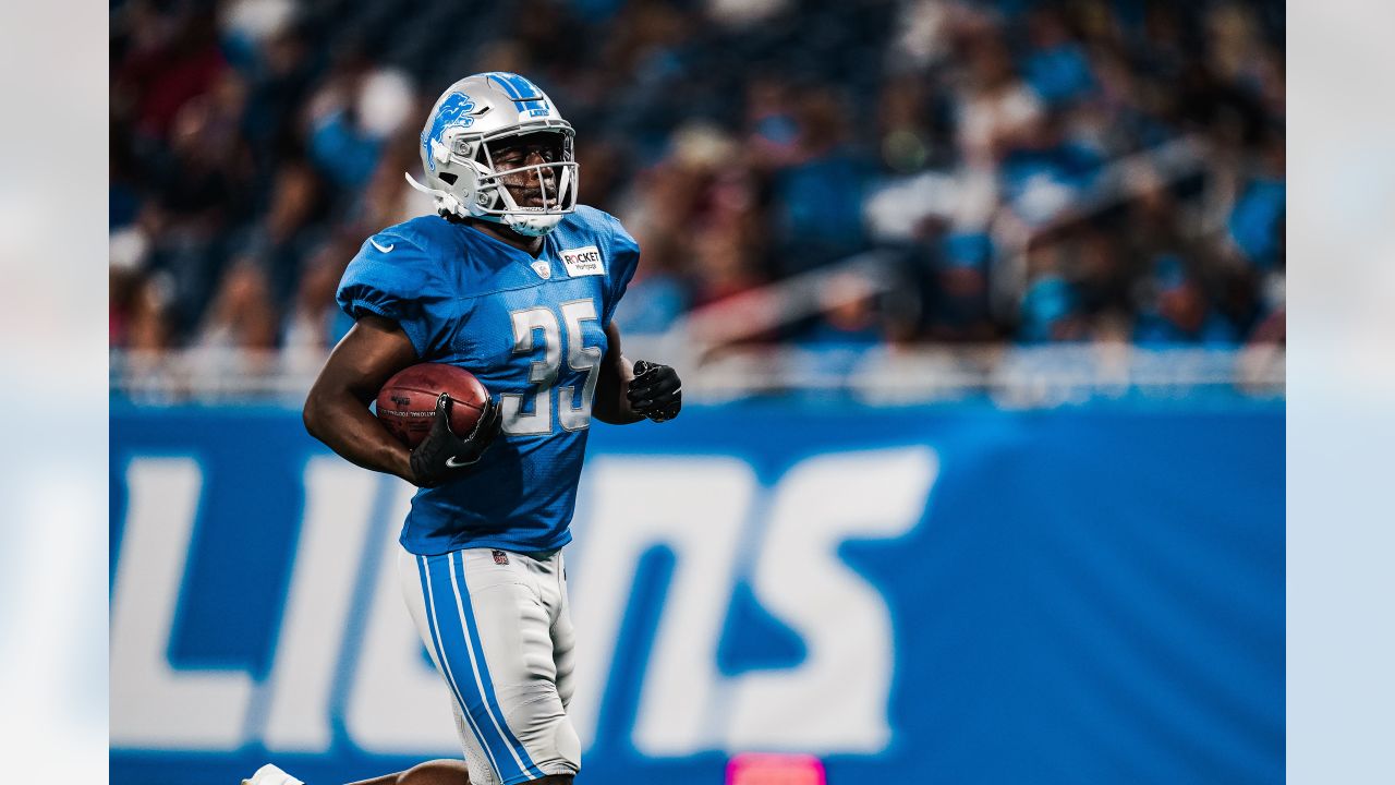 Detroit Lions running back Godwin Igwebuike (35) looks down the field after  a play during the second half of an NFL preseason football game between the Detroit  Lions and the Indianapolis Colts