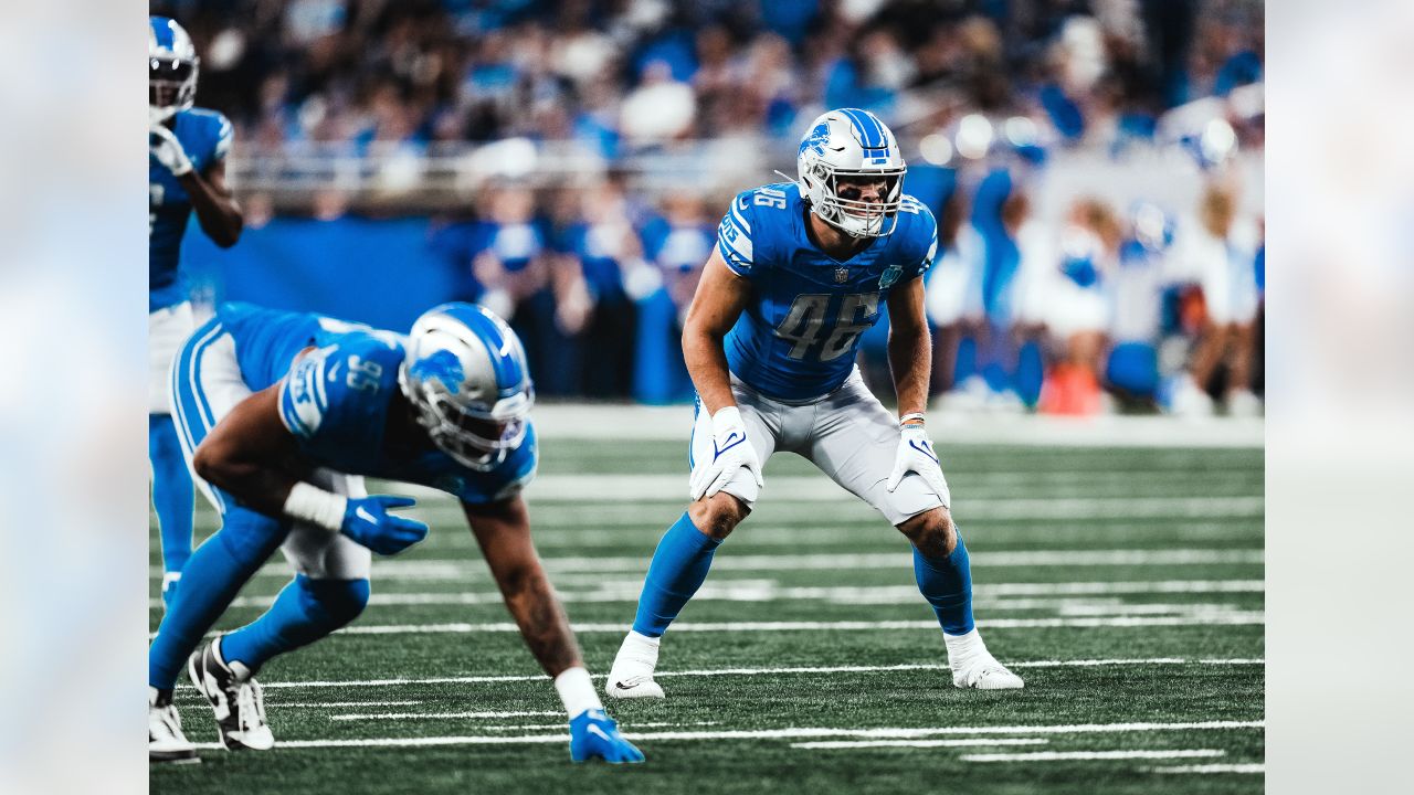 Malcolm Rodriguez and Jack Campbell of the Detroit Lions tackle