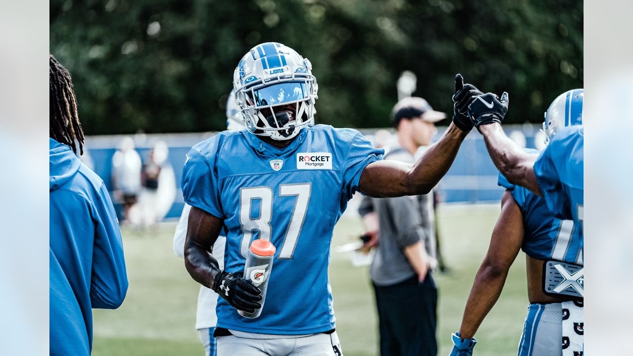 FOXBOROUGH, MA - OCTOBER 09: Detroit Lions running back Jamaal Williams  (30) interacts with fans prior to the NFL game between Detroit Lions and  New England Patriots on October 9, 2022, at