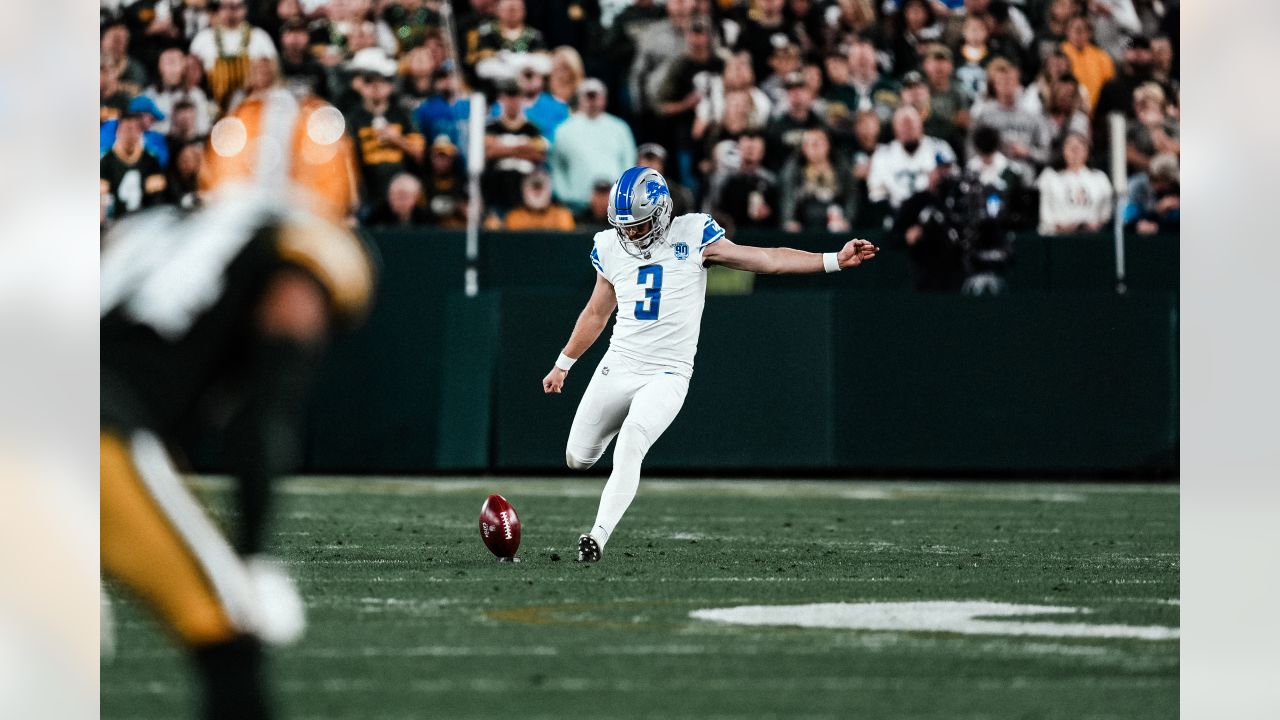 Detroit Lions punter Jack Fox (3) kicks off against the Green Bay