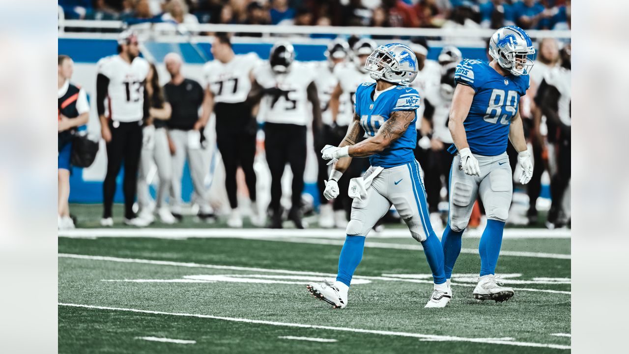 Detroit Lions runing back Craig Reynolds (46) is atckled by Buffalo Bills  linebacker Andre Smith (59) during the second half of the preseason NFL  football game against the Buffalo Bills in Detroit