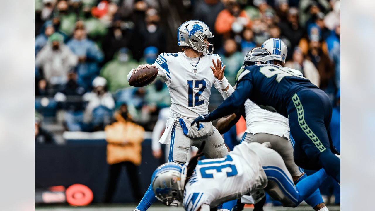 Detroit Lions wide receiver Amon-Ra St. Brown (14) runs the ball against  New York Giants cornerback Rodarius Williams (25) during the second half of  an NFL football game, Sunday, Nov. 20, 2022