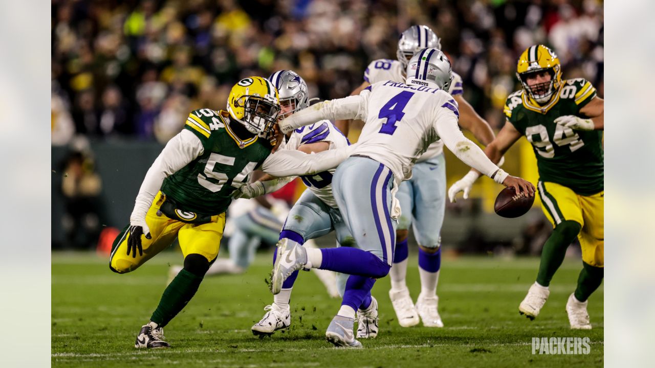 Christian Watson showing off his backflip to Packers fans in training