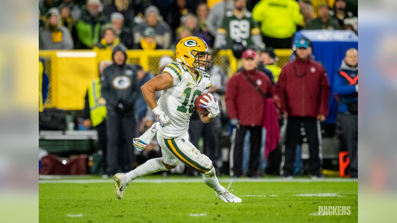 ASHWAUBENON, WI - AUGUST 05: Green Bay Packers wide receiver Allen Lazard  (13) grabs his helmet during Green Bay Packers Family Night at Lambeau  Field, on August 5, 2022 in Green Bay