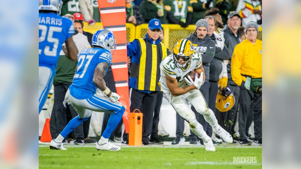 ASHWAUBENON, WI - AUGUST 05: Green Bay Packers wide receiver Allen Lazard  (13) grabs his helmet during Green Bay Packers Family Night at Lambeau  Field, on August 5, 2022 in Green Bay