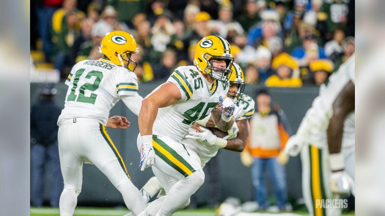 ASHWAUBENON, WI - AUGUST 05: Green Bay Packers wide receiver Allen Lazard  (13) grabs his helmet during Green Bay Packers Family Night at Lambeau  Field, on August 5, 2022 in Green Bay