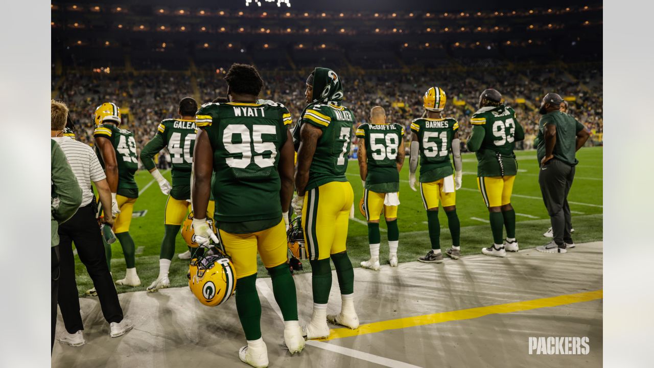 Green Bay Packers quarterback Danny Etling (19) runs for a touchdown during  an NFL Preseason game against the New Orleans Saints Friday, Aug. 19, 2022,  in Green Bay, Wis. (AP Photo/Jeffrey Phelps