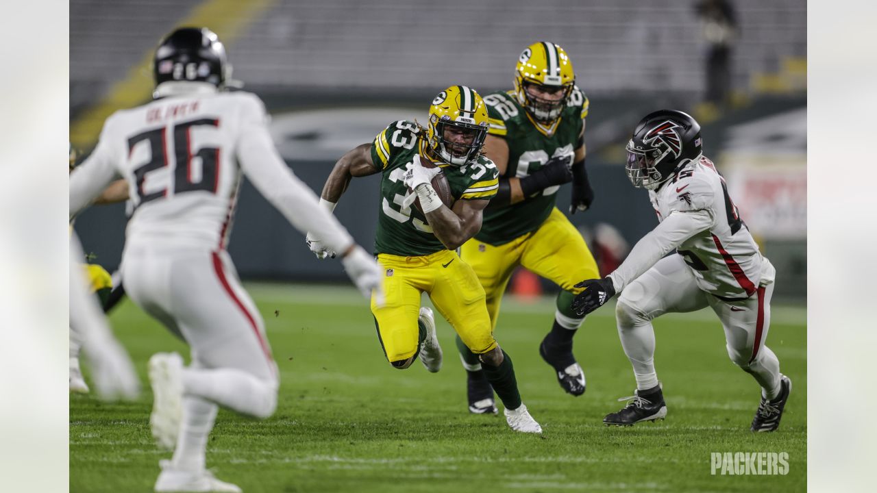 Aaron Jones glad to be back with Green Bay Packers, has 'unfinished  business' - ESPN