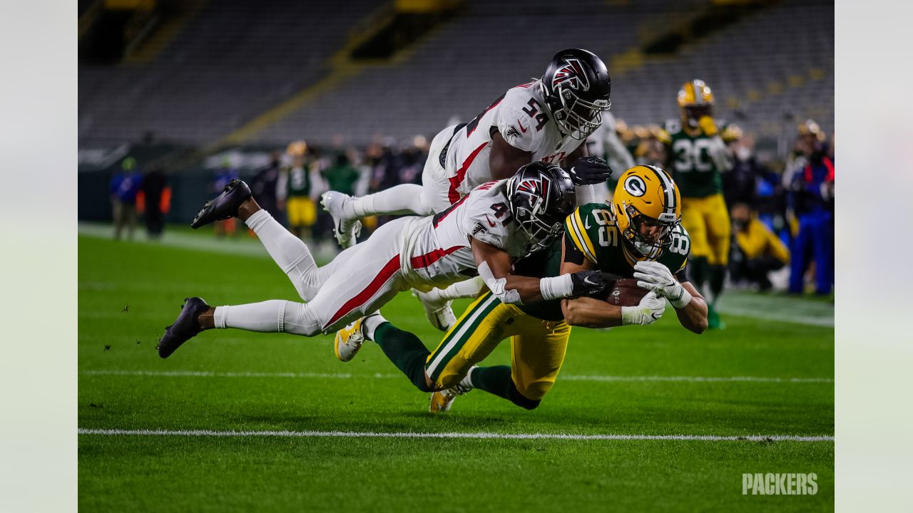 Rodgers, Tonyan lead Packers to 30-16 victory over Falcons