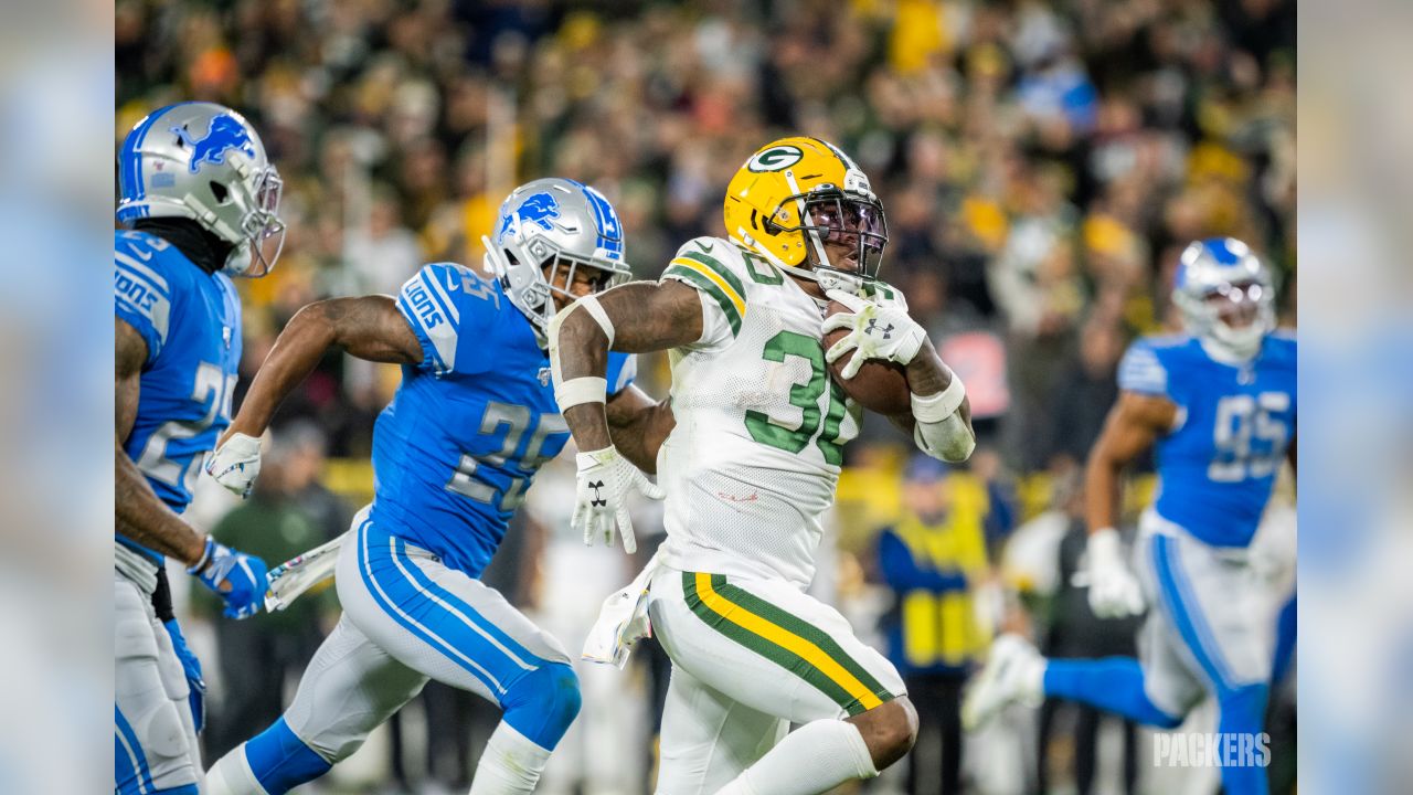 ASHWAUBENON, WI - AUGUST 05: Green Bay Packers wide receiver Allen Lazard  (13) grabs his helmet during Green Bay Packers Family Night at Lambeau  Field, on August 5, 2022 in Green Bay