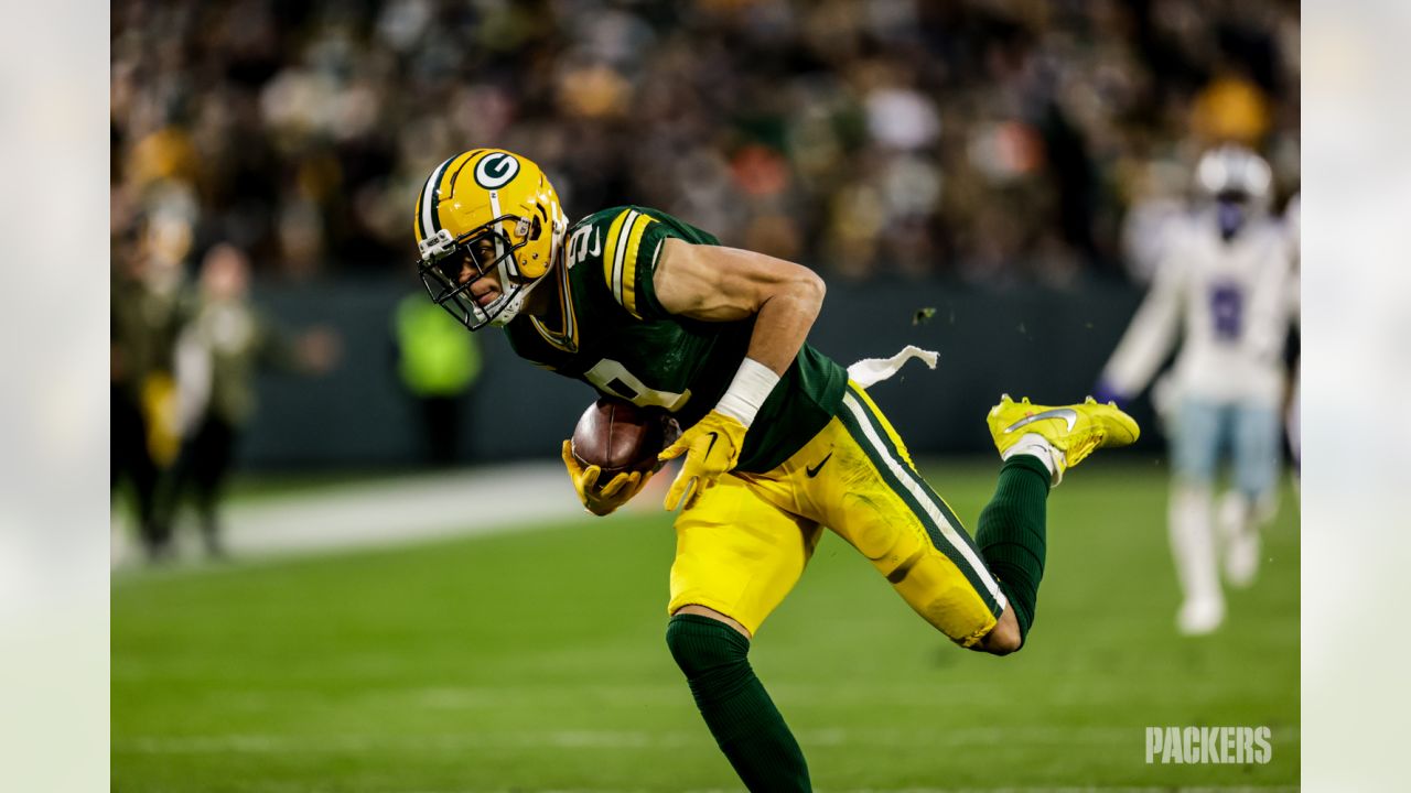 Green Bay Packers safety Rudy Ford (20) celebrates intercepting a Dallas  Cowboys quarterback Dak Prescott pass during the first half of an NFL  football game Sunday, Nov. 13, 2022, in Green Bay