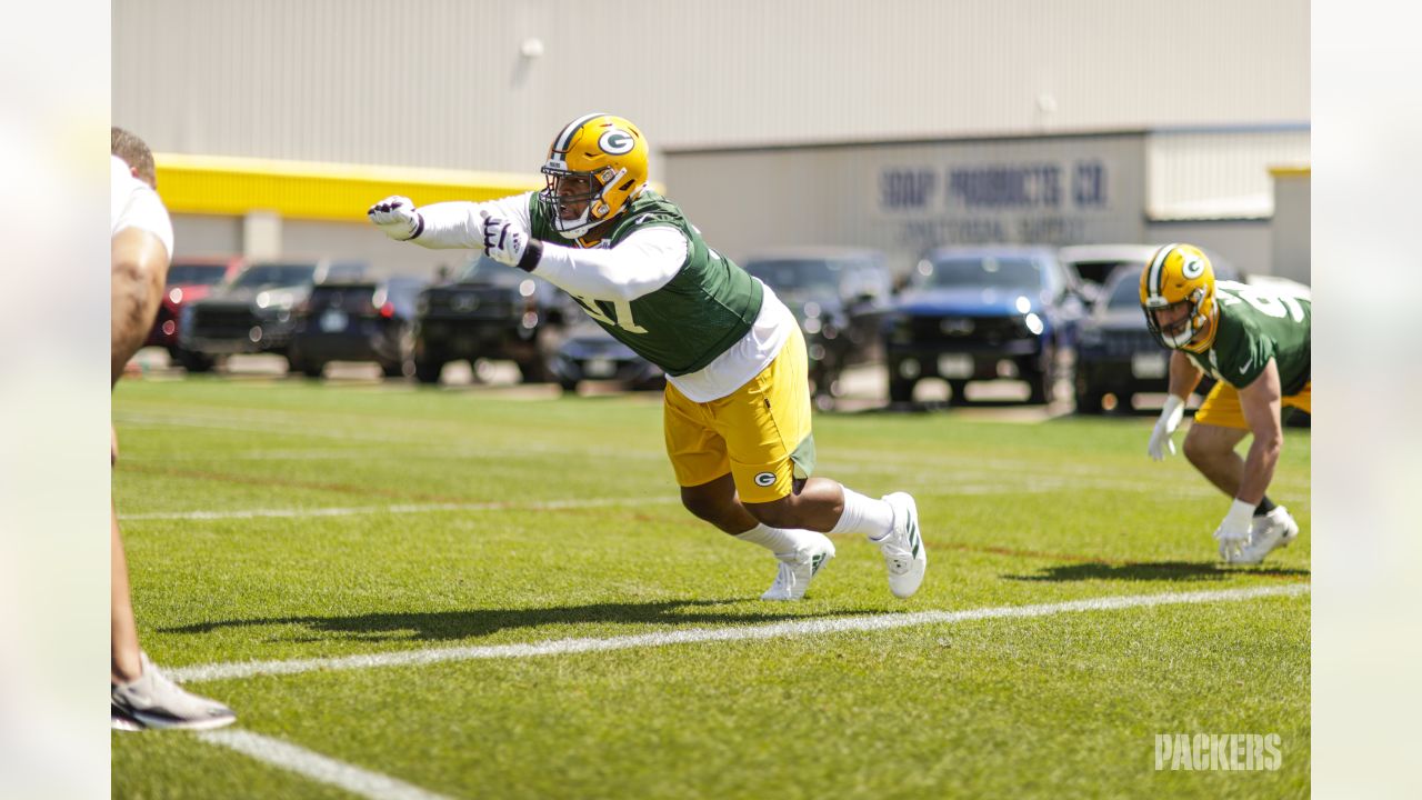 Miami. FL USA; Green Bay Packers running back AJ Dillon (28) is tripped up  while running with the ball short of the end zone during an NFL game again  Stock Photo - Alamy