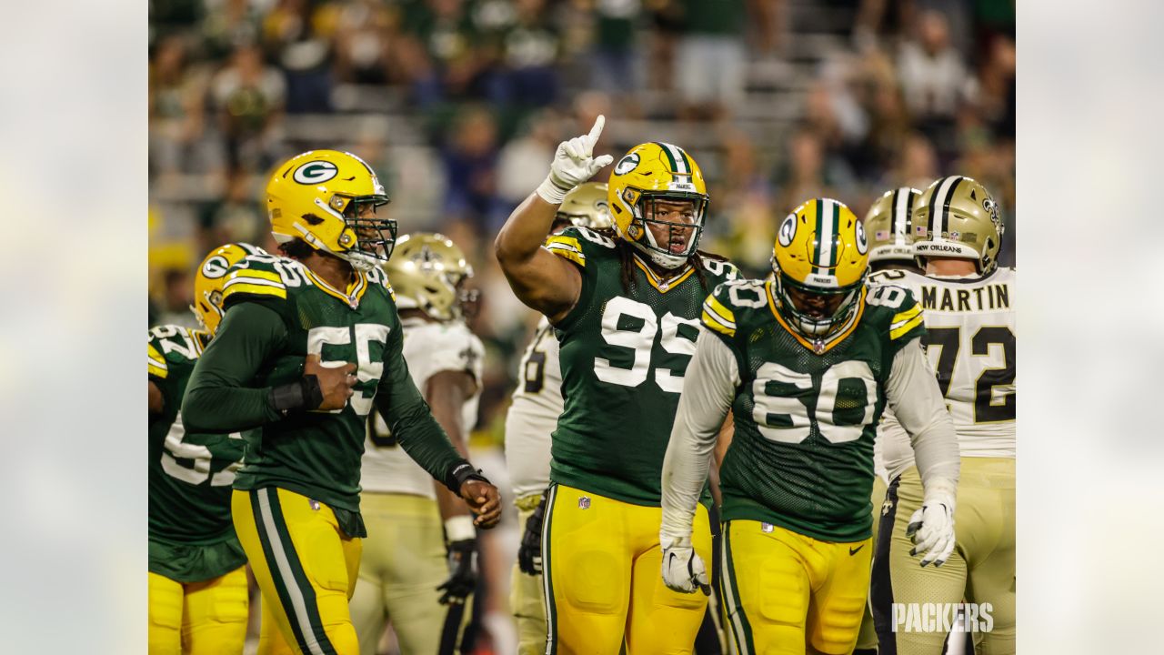 Green Bay Packers quarterback Danny Etling (19) runs for a touchdown during  an NFL Preseason game against the New Orleans Saints Friday, Aug. 19, 2022,  in Green Bay, Wis. (AP Photo/Jeffrey Phelps