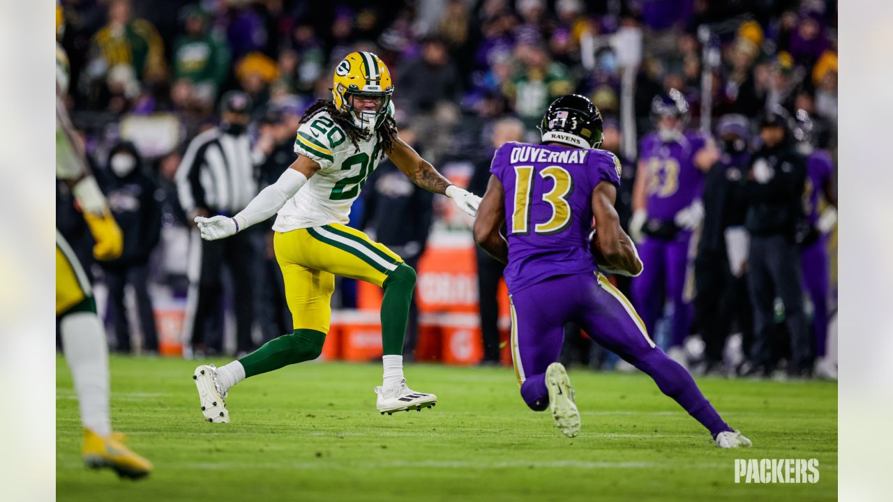 BALTIMORE, MD - DECEMBER 19: Packers running back A.J. Dillon (28) runs the  ball during the Green Bay Packers versus Baltimore Ravens NFL game at M&T  Bank Stadium on December 19, 2021