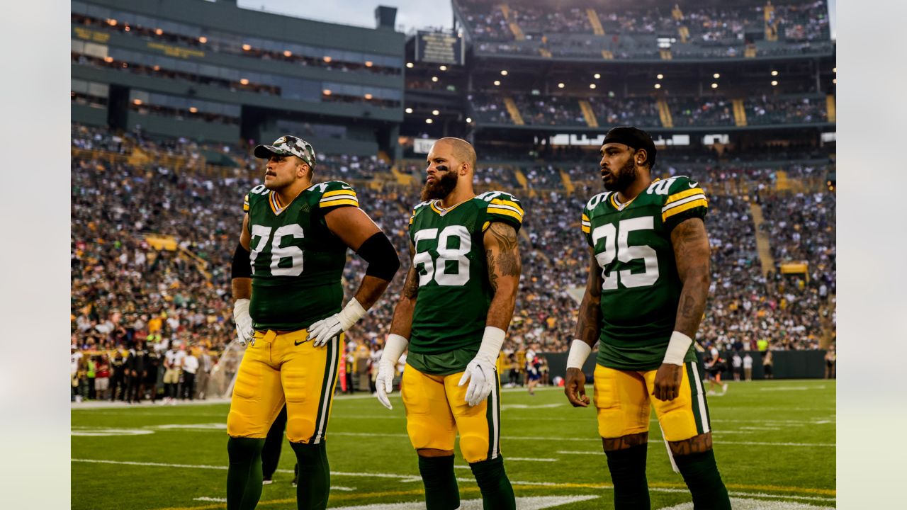 Green Bay Packers quarterback Danny Etling (19) runs for a touchdown during  an NFL Preseason game against the New Orleans Saints Friday, Aug. 19, 2022,  in Green Bay, Wis. (AP Photo/Jeffrey Phelps