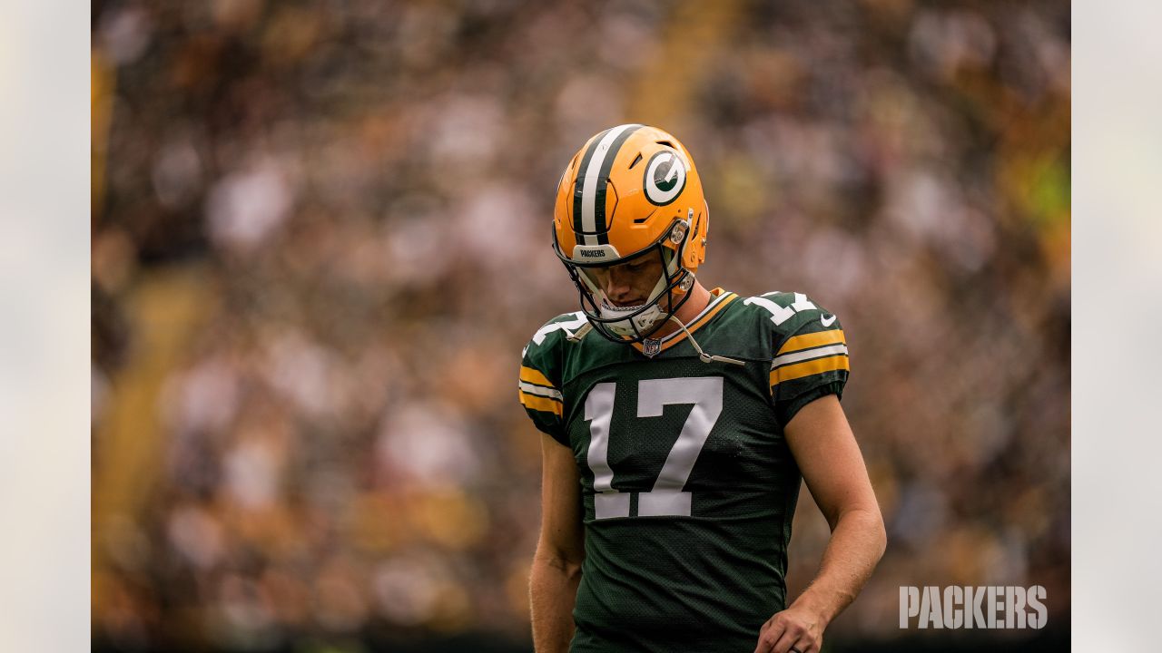 Green Bay Packers linebacker Rashan Gary (52) and defensive back Darnell  Savage (26) set up for a play during the first half of an NFL football game  against the New Orleans Saints