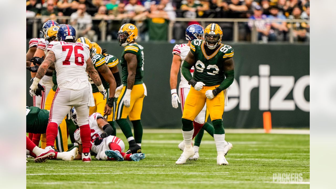 Green Bay Packers players form a huddle as they warm-up before an NFL game  between the New York Giants and the Green Bay Packers at the Tottenham  Hotspur stadium in London, Sunday