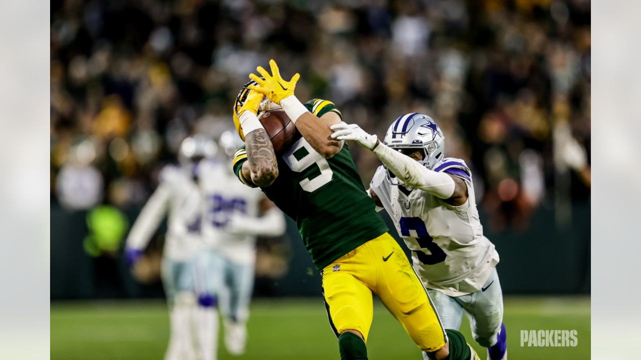 Green Bay Packers safety Rudy Ford (20) celebrates intercepting a Dallas  Cowboys quarterback Dak Prescott pass during the first half of an NFL  football game Sunday, Nov. 13, 2022, in Green Bay