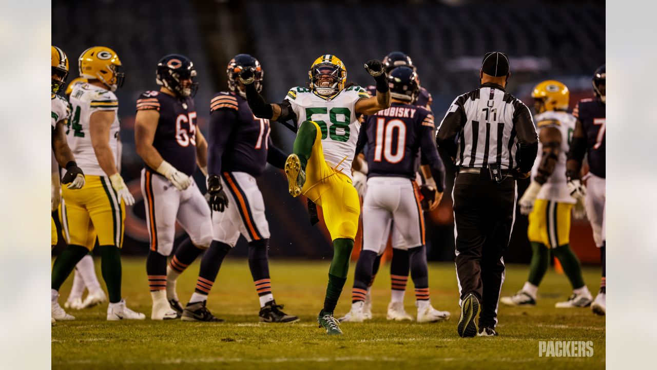 Rodgers throws 4 TDs, Packers beat Bears 35-16 for top seed