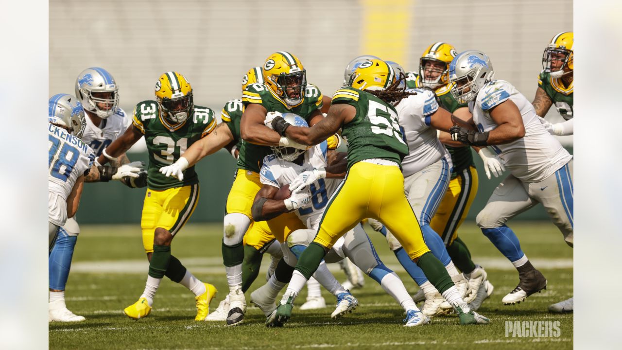 Green Bay Packers' Za'Darius Smith (55) and Kingsley Keke ride